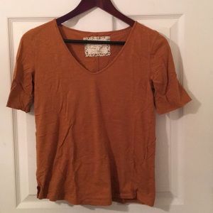 Anthropologie tee in mustard